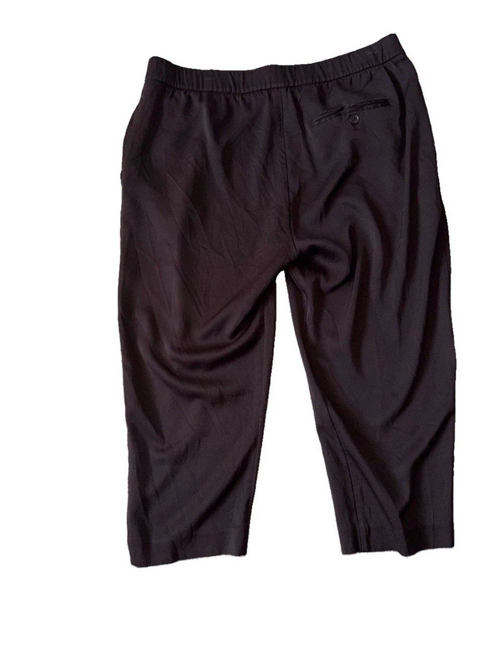 A sleek pair of Reiss women’s trousers in classic black, designed with a comfort